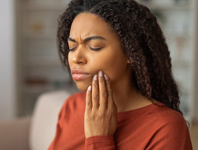 woman with mouth pain